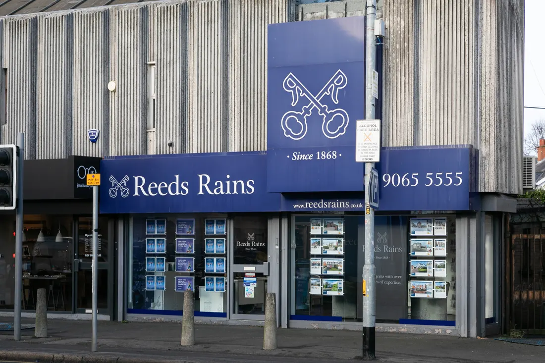 Reeds Rains estate agency branch signage