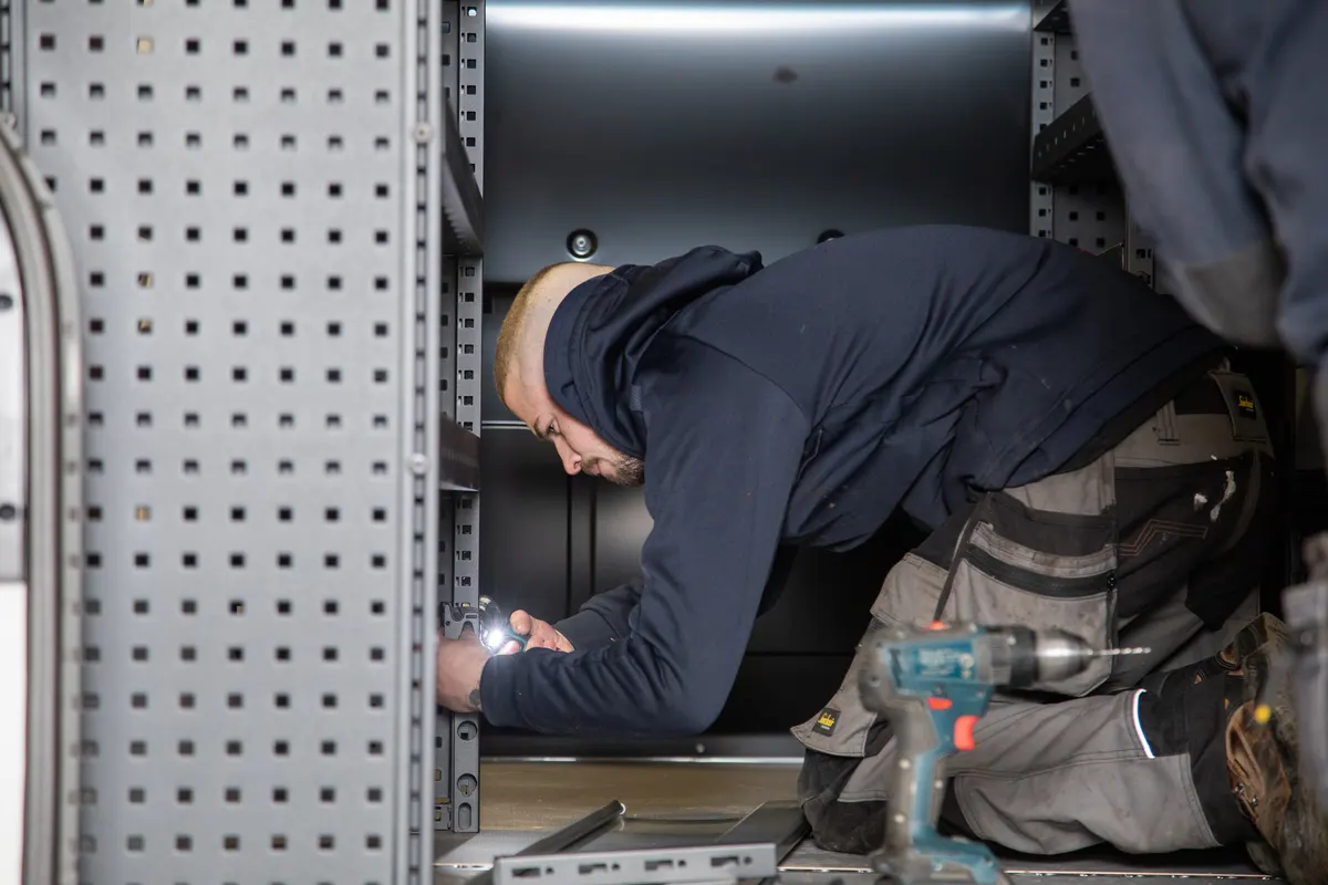 Modular van racking system fitted inside a work van by Barrett Group in Northern Ireland