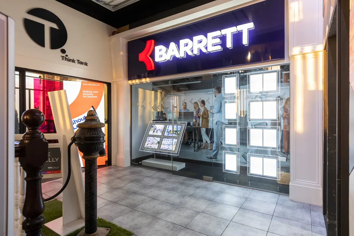 Illuminated shop front signage manufactured and fitted by Barrett Group in Northern Ireland